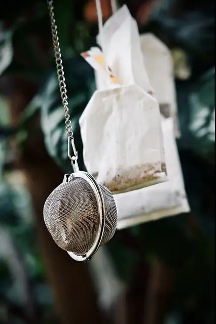 tea bags and loose leaf tea in ball hanging